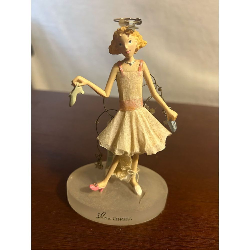 Hallmark Angel of shopping figure